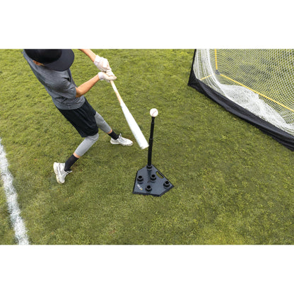 Overhead shot of youth male hitting off SKLZ 5-Position Tee on a field into a net