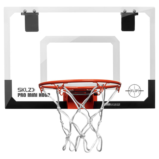 The basketball hoop is mounted on a backboard in a play area.