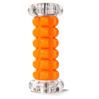 A cylindrical container with orange pills inside resting on a clear plastic stand