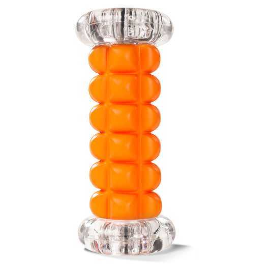 A cylindrical container with orange pills inside resting on a clear plastic stand