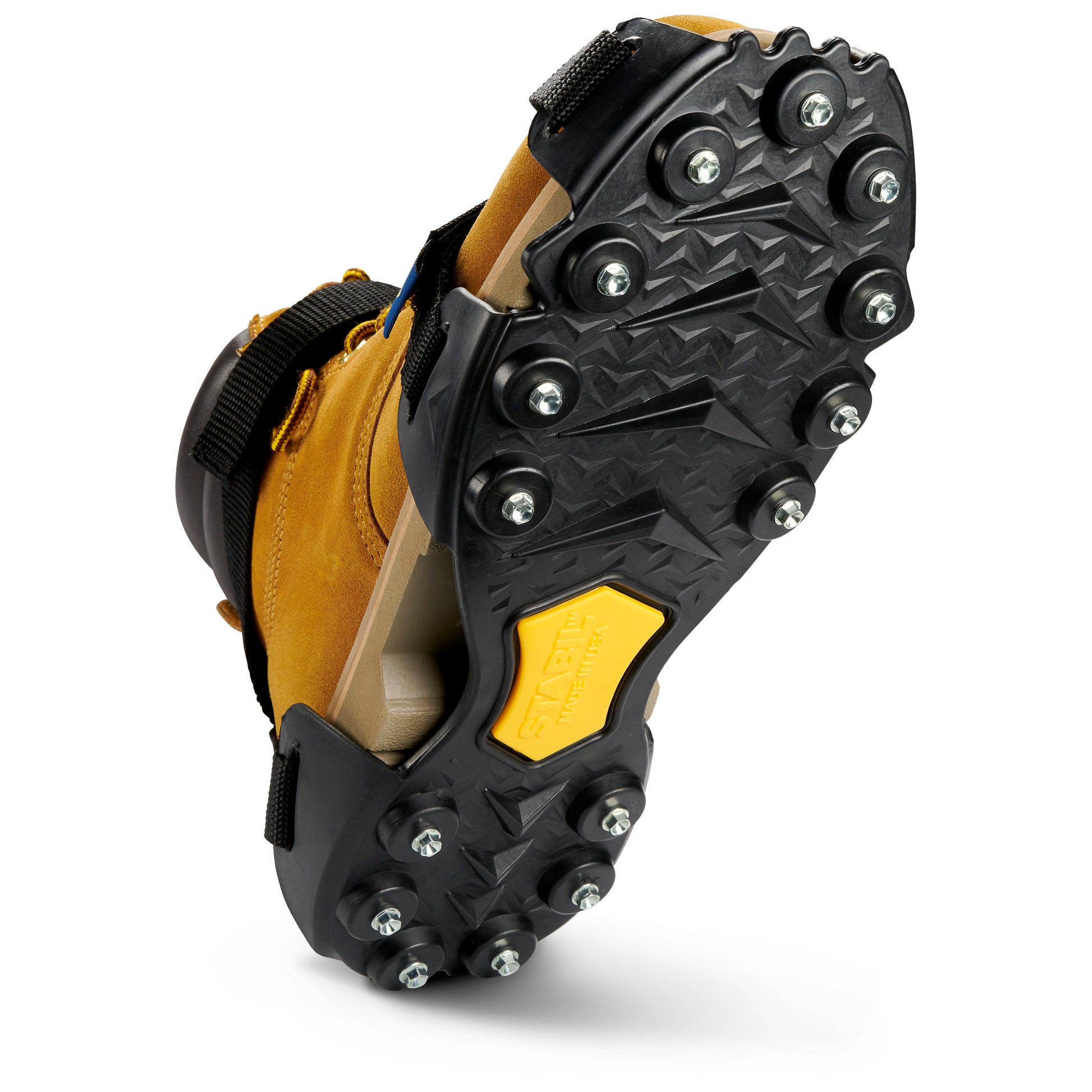 A hiking boot shows sole with metal spikes for traction on rugged terrain.