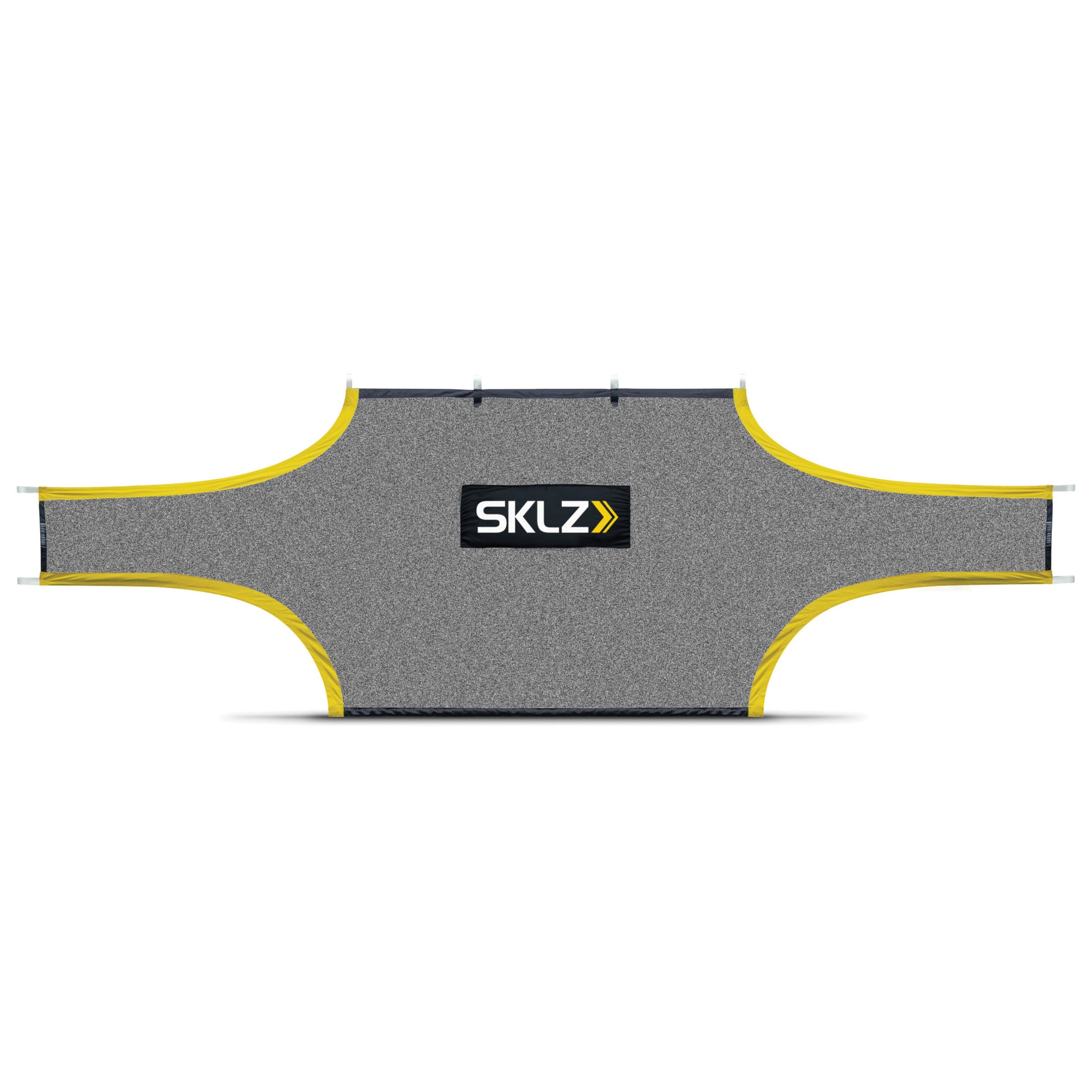 The inflatable ski jump inflates on a flat surface with a SKLZ logo in the center