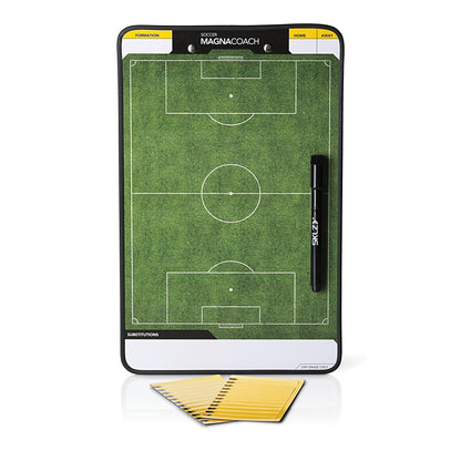 A soccer tactics board draws formations on a field with marker and sticky notes for strategy