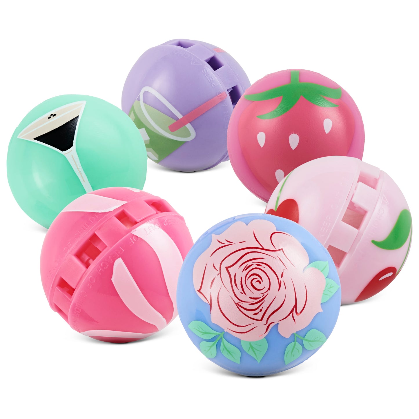 Colorful round yo-yos rest on white surface, each with distinct playful designs and patterns.