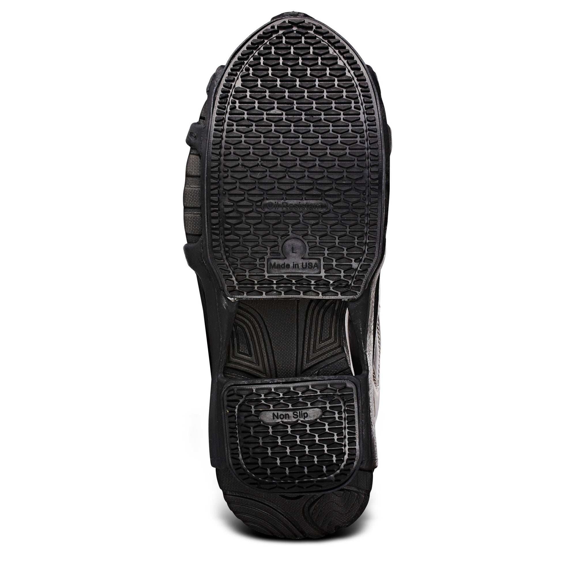 Shoe sole shows non slip tread pattern on the bottom surface of a shoe.