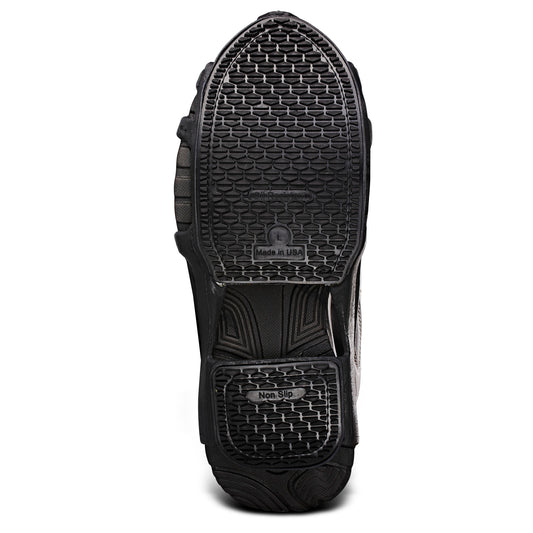 Shoe sole shows non slip tread pattern on the bottom surface of a shoe.