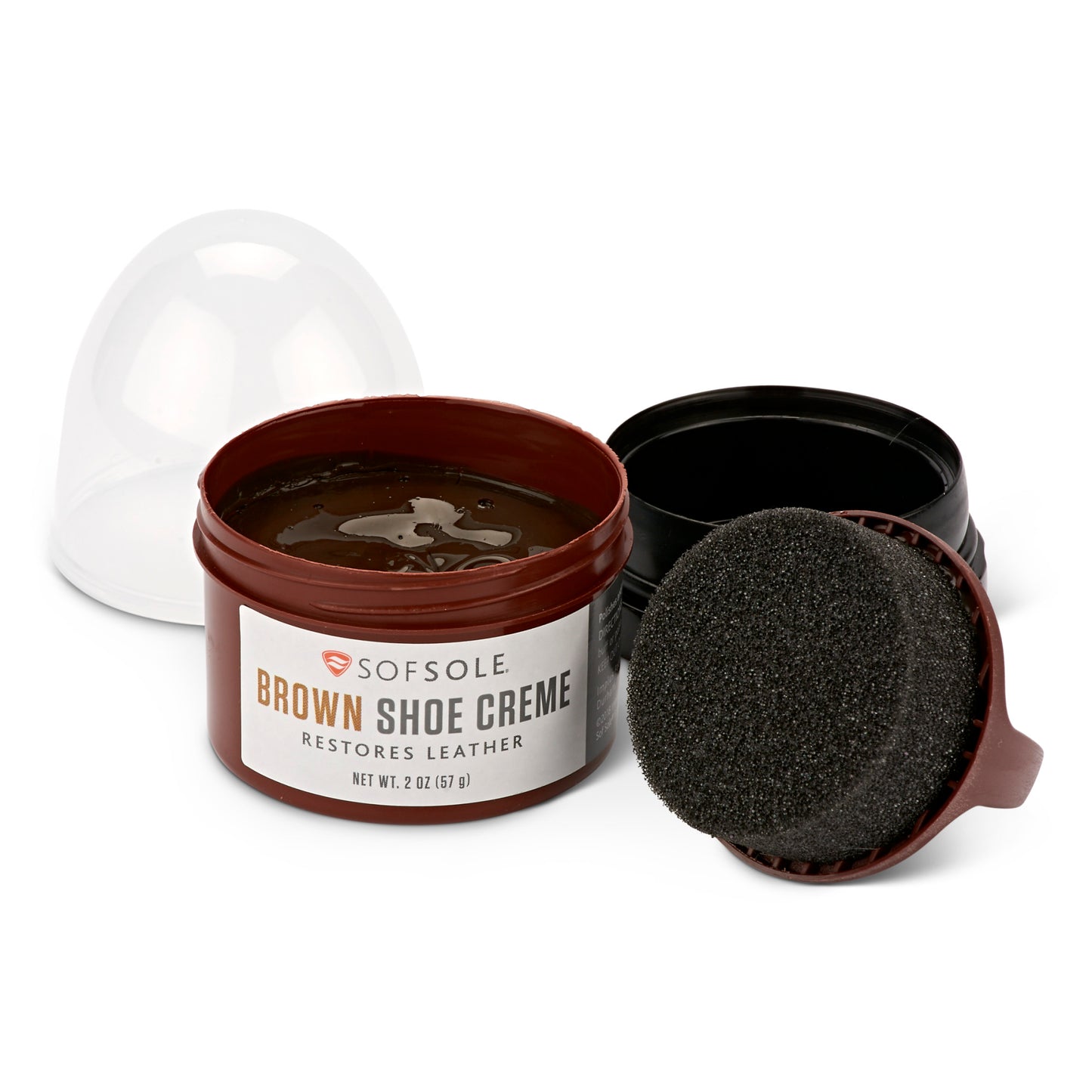Shoe polish rests in a container with a sponge applicator for restoring leather footwear.