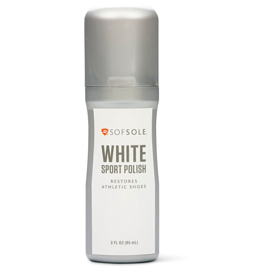 A bottle of SOFsole White Sport Polish restores athletic shoes in a plain environment.