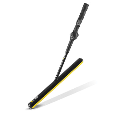 A black and yellow golf putter strikes the ground on a white background