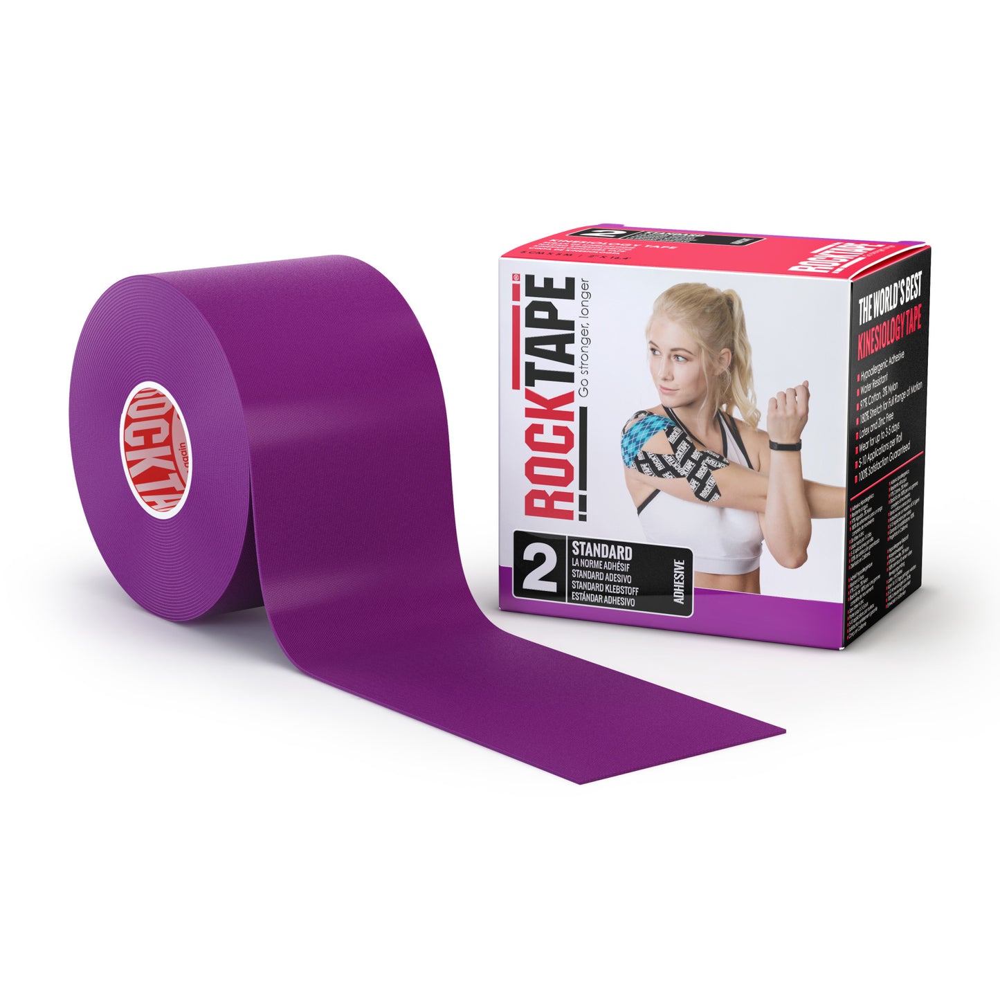 A roll of purple athletic tape being used to secure a girl's arm for injury prevention or support in a sports setting.