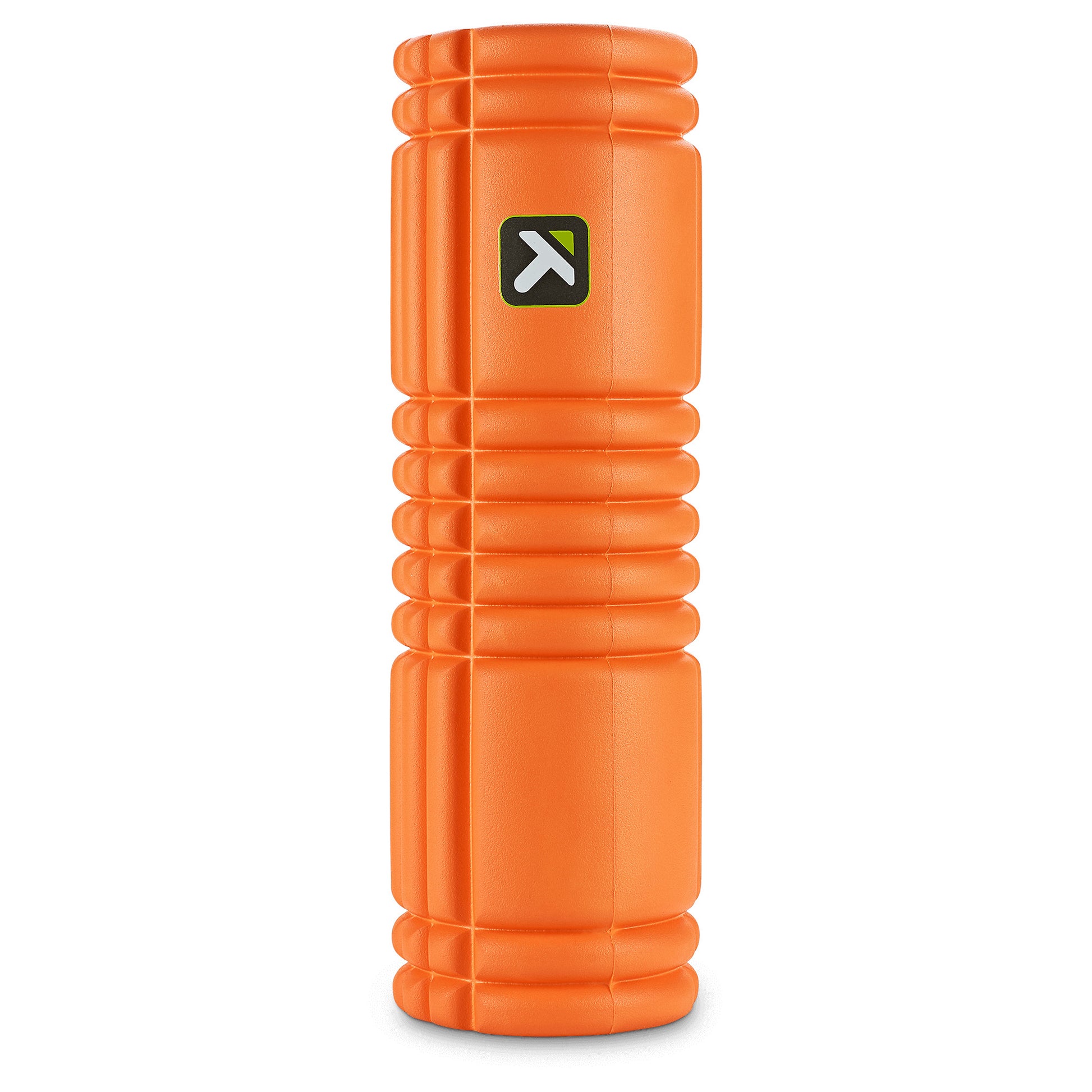 Foam roller rolls on gym floor for exercise and muscle recovery.