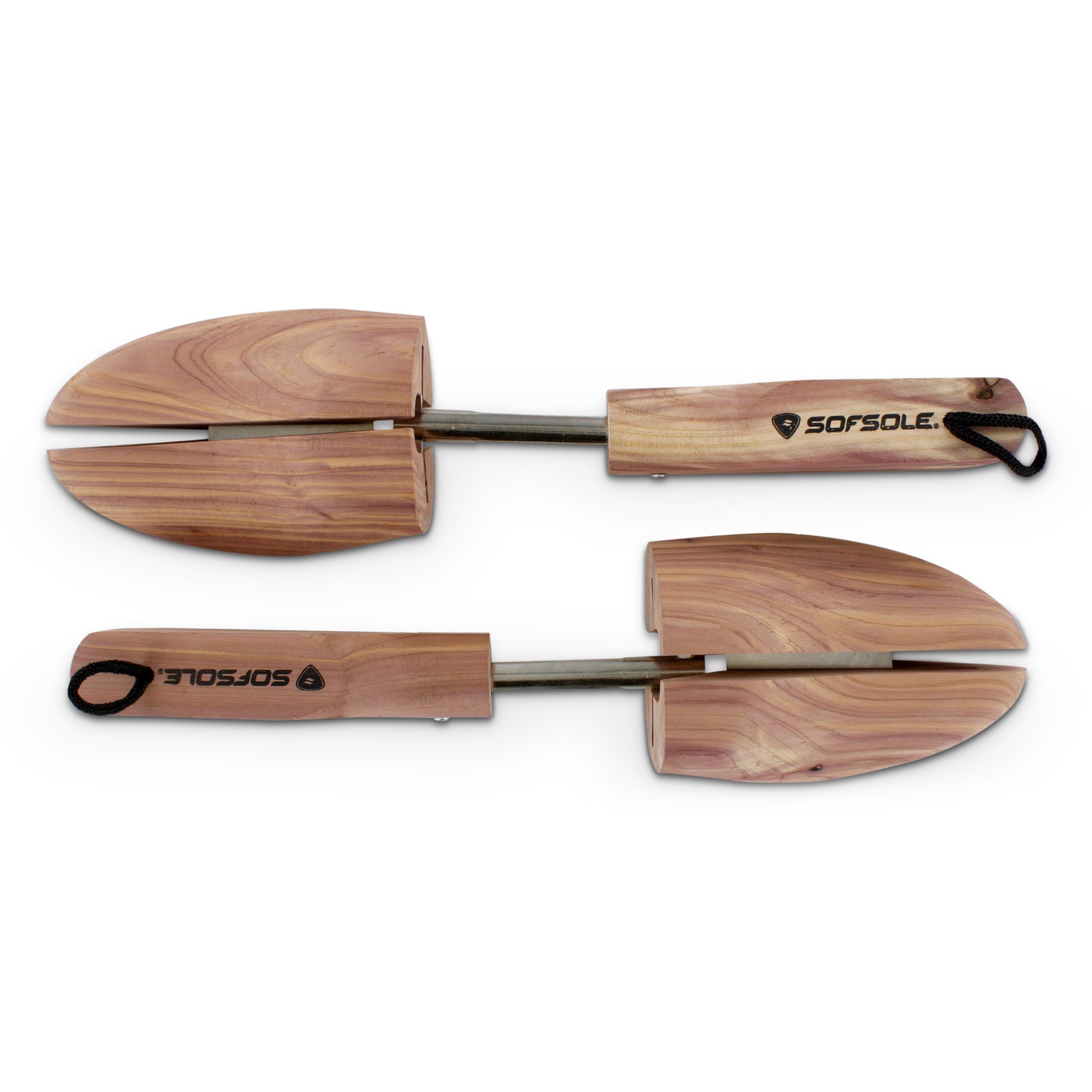 Wooden snow shovels are arranged parallel on a white background for display.