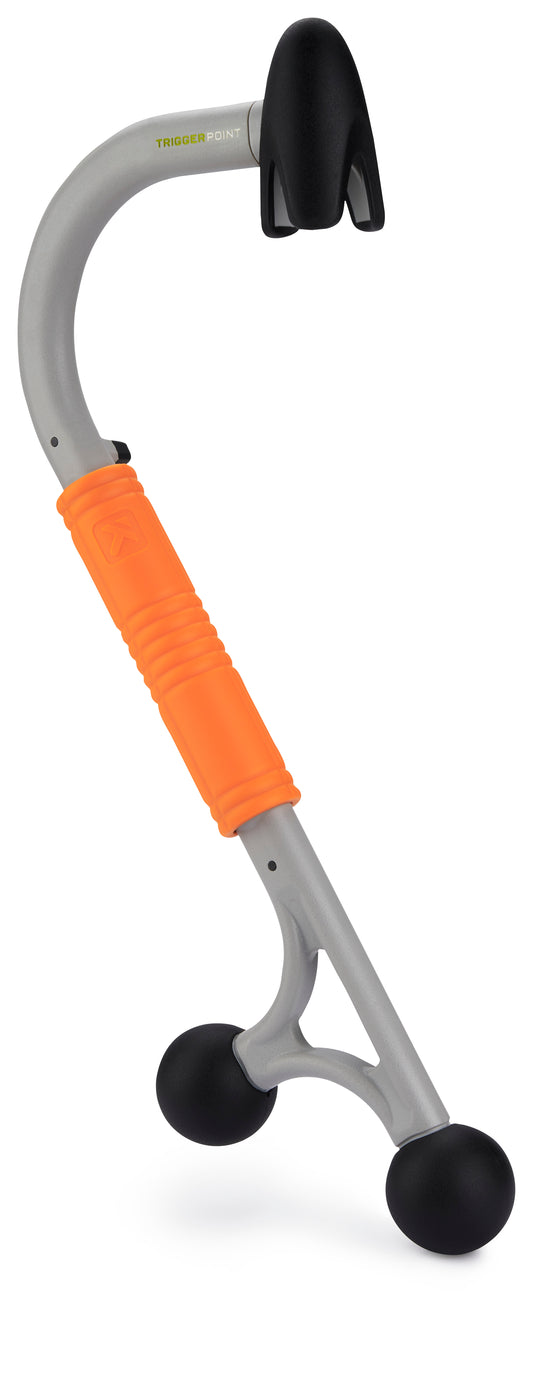 The device is a handheld massage tool on a white background