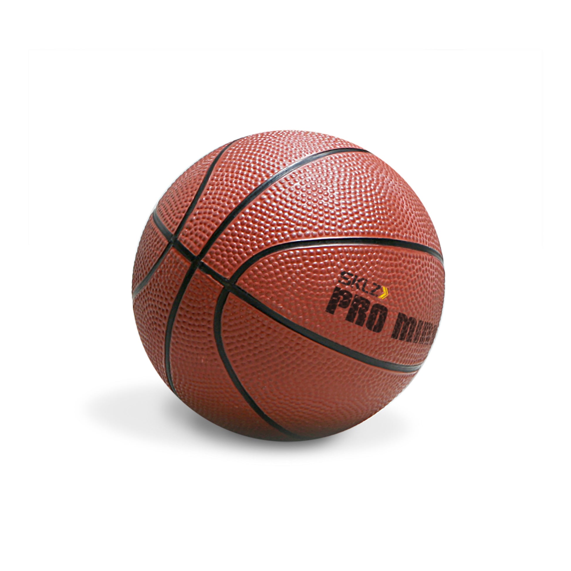 A basketball rolls on a white background