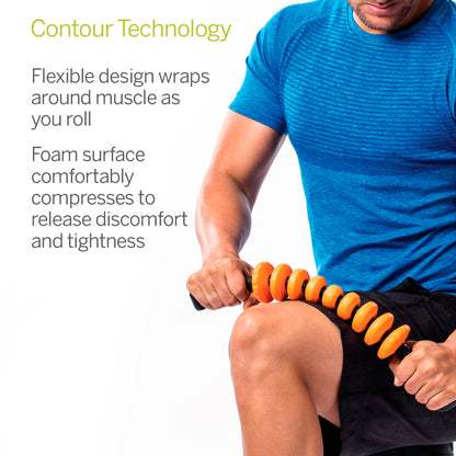 A person uses a massage roller on their thigh amidst a fitness environment.