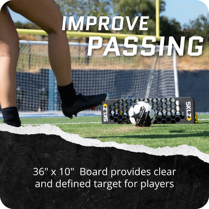 Player kicks soccer ball with a training aid on an outdoor field for improving passing skills