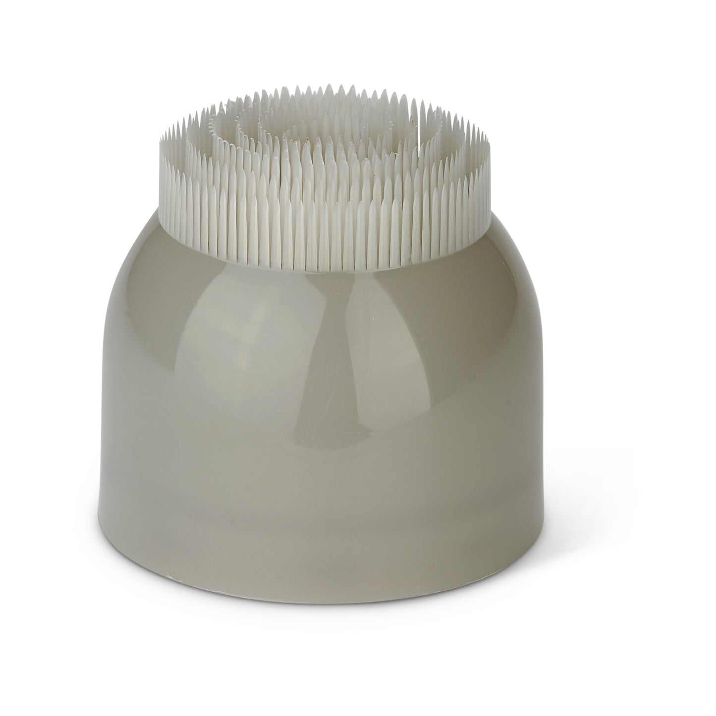 A grey ceramic holder with toothpicks inside in a white background.
