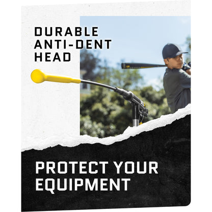 Golf club and tee are aimed at a golfer preparing to swing outdoors