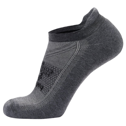 A gray athletic sock with a zipper design on the side in a neutral environment