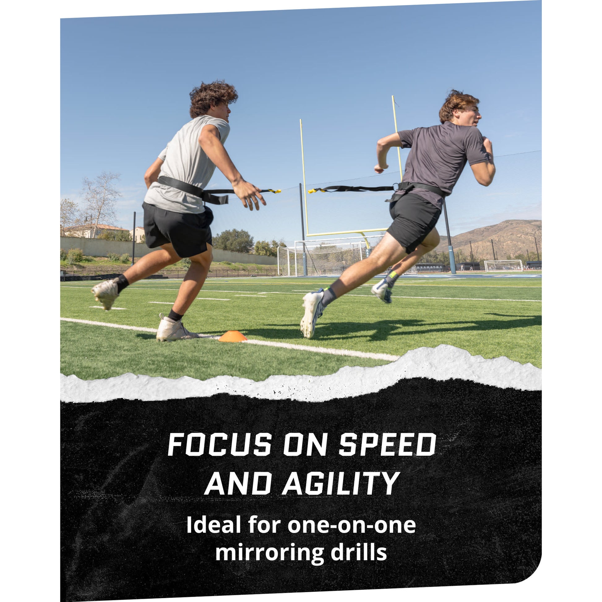 Two runners train with resistance bands on a track during daylight for speed and agility