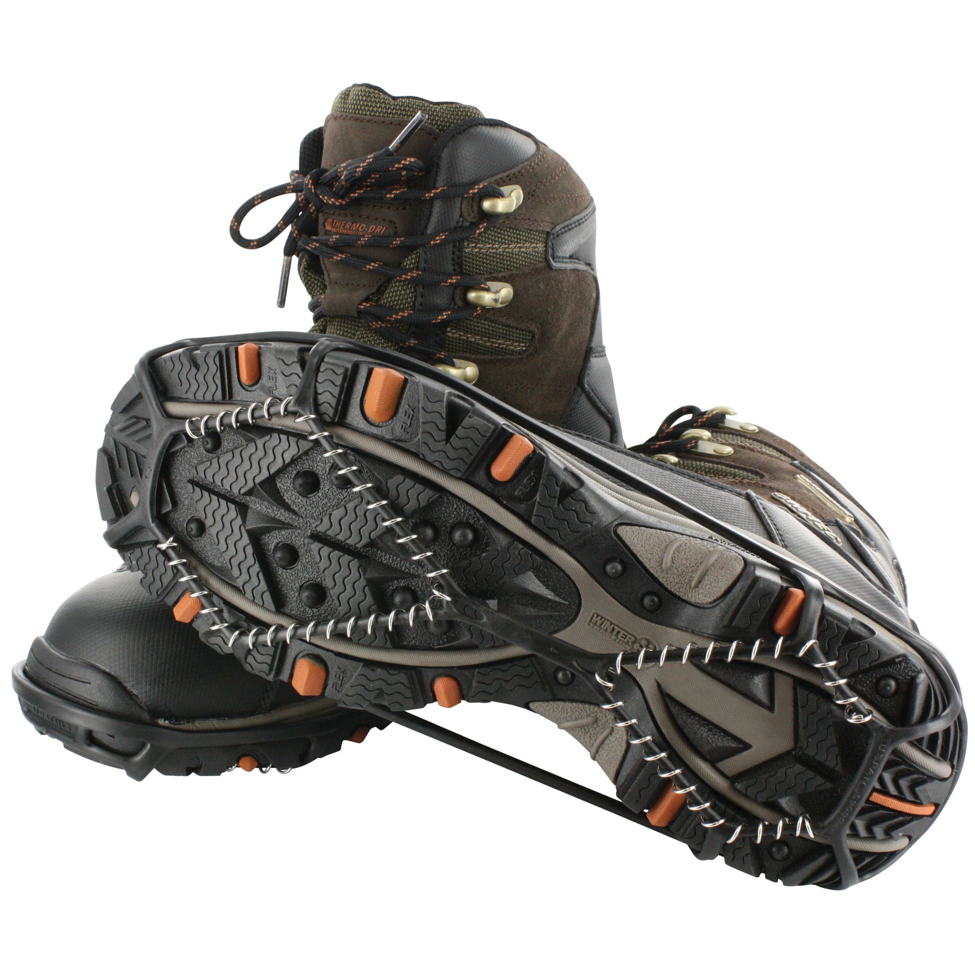 A hiking boot is displayed with a snow chain wrapped around the sole in a neutral environment.