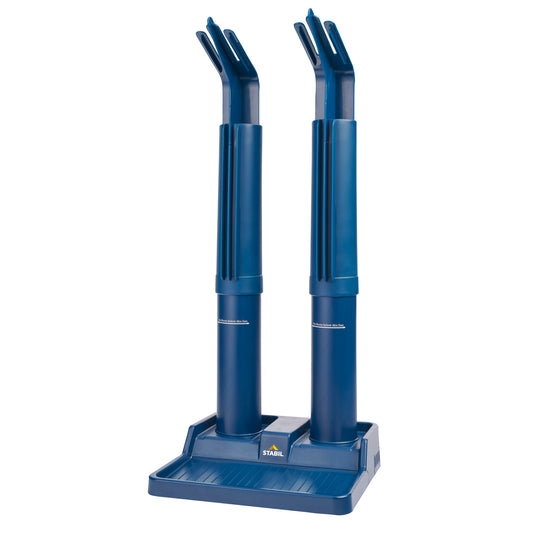 Two blue robotic arms are mounted on a shared base in a laboratory or workspace environment.