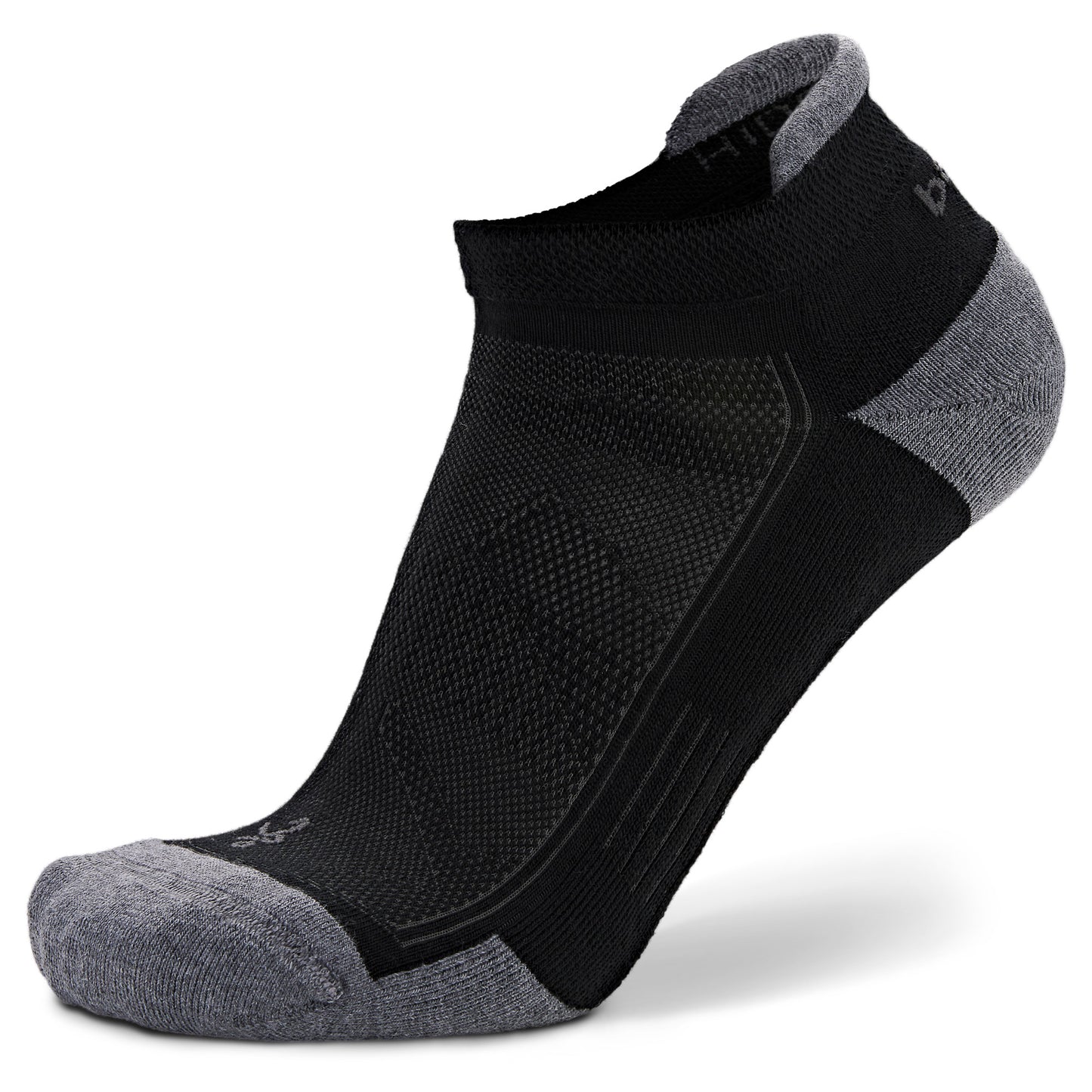 Athletic ankle sock maintains comfort during sports activities on a plain white background.