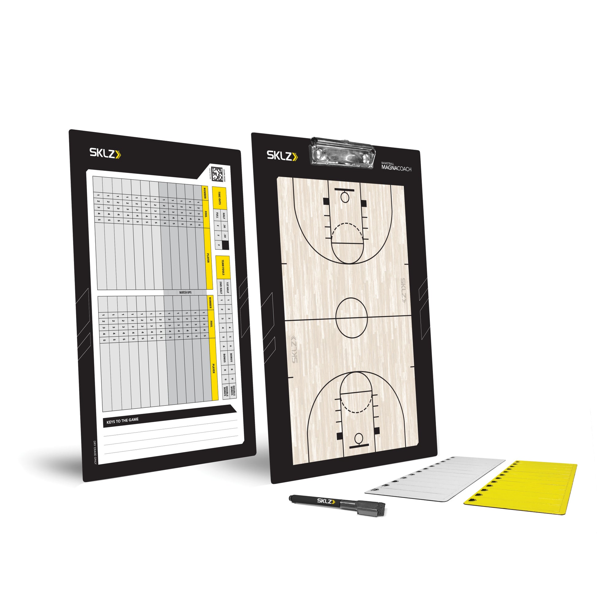 A basketball scoreboard and game board set with writing tools in a sports environment