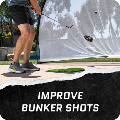 Golfer hits ball from bunker beside a net with the text improve bunker shots