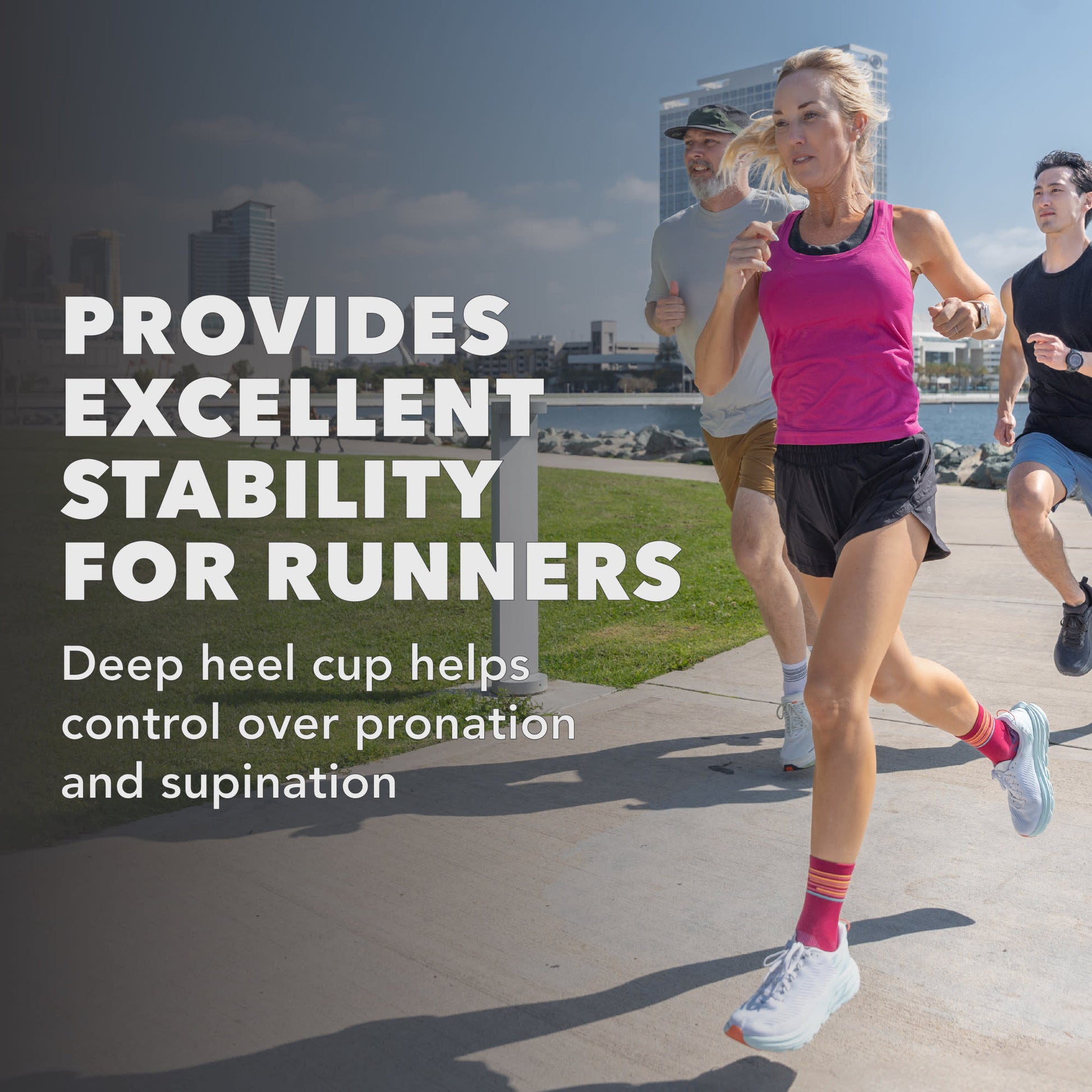 Runners wear deep heel cups for stability during outdoor exercise in an urban setting.