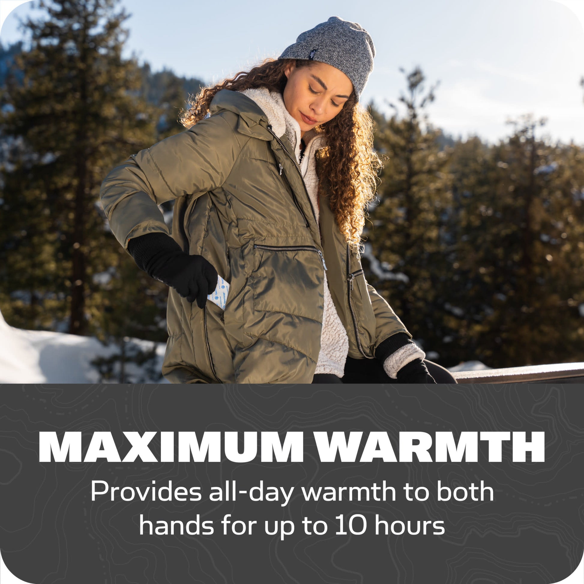 Woman in winter jacket uses maximum warmth gloves outdoors in snowy forest environment
