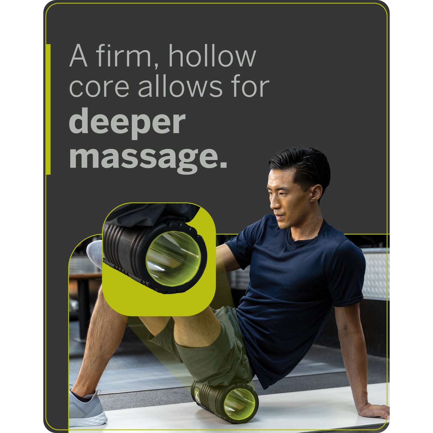 A man uses a foam roller for massage on his leg in a gym environment.