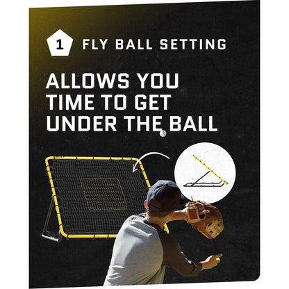 A boy practicing baseball fielding under a fly ball net for training