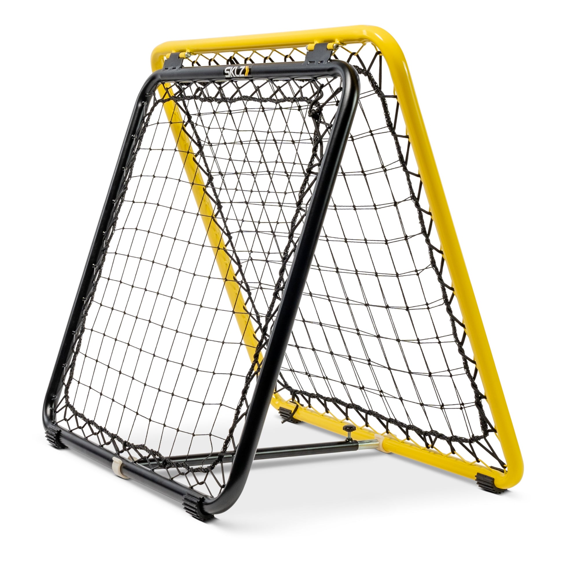 Two sports rebounders are set up for practice in a bright indoor environment