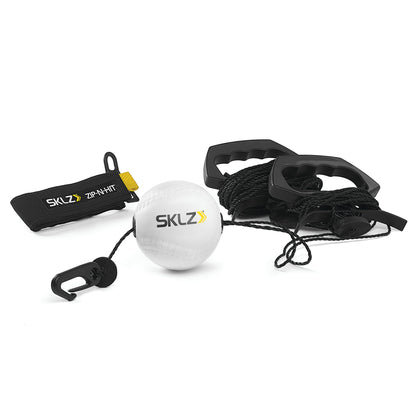 A SKLZ resistance training set with a tether ball ankle strap and handles on a white background