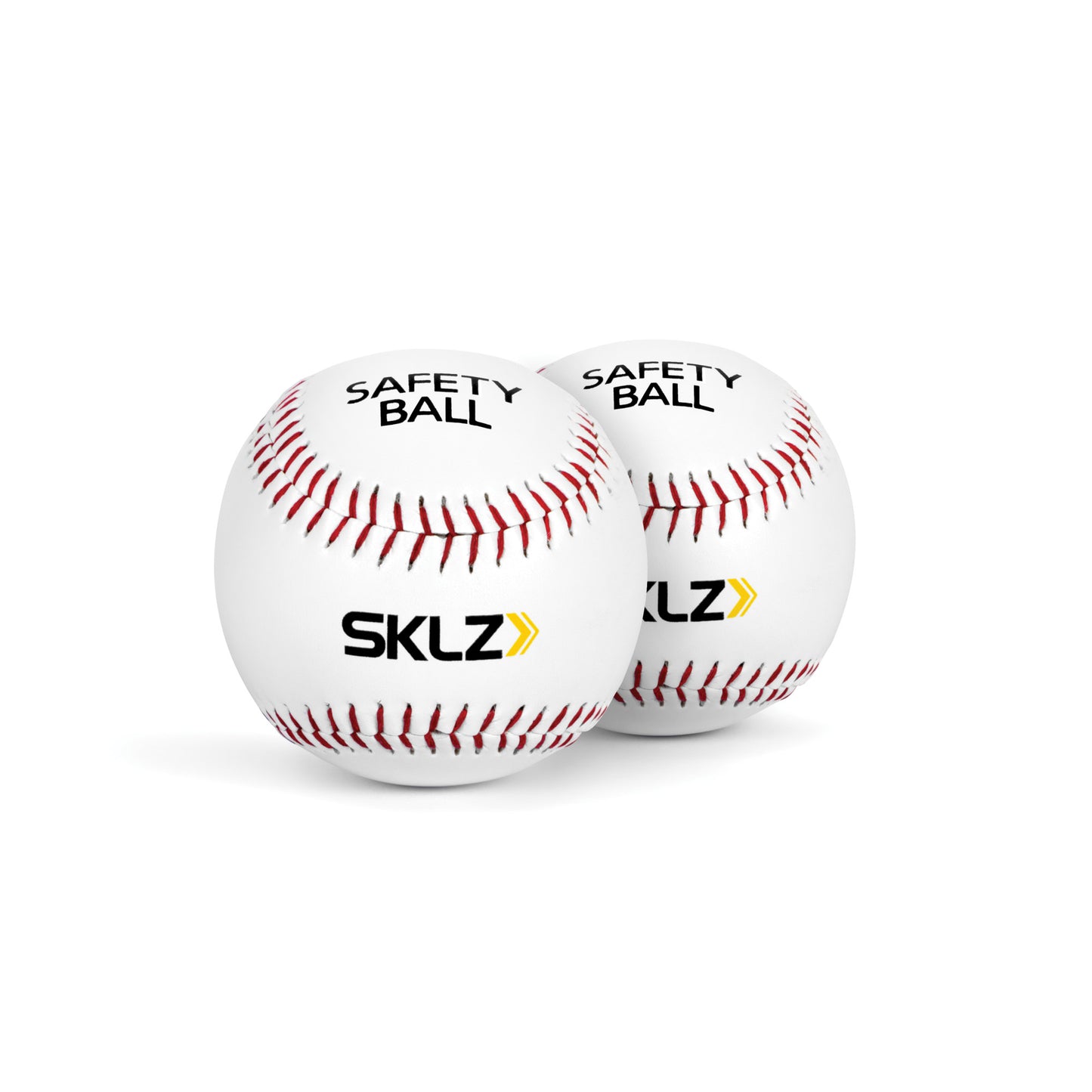 Two safety baseballs labeled SKLZ rest on a white surface with a plain white background