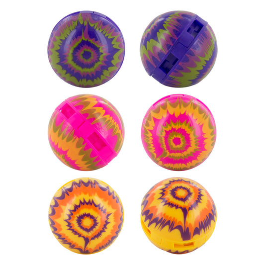 Colorful tie-dye patterned balls spin on a white surface for recreational play.
