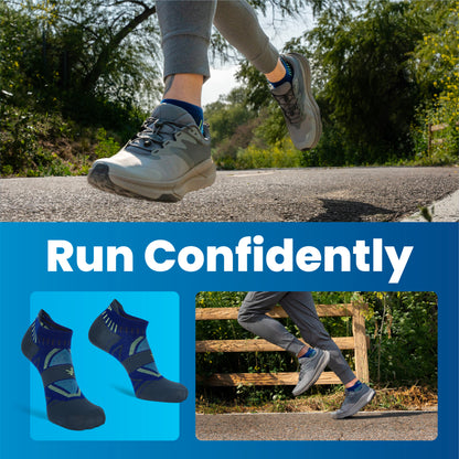 A person running outdoors on a paved path with trees in the background, wearing athletic shoes and gray pants.