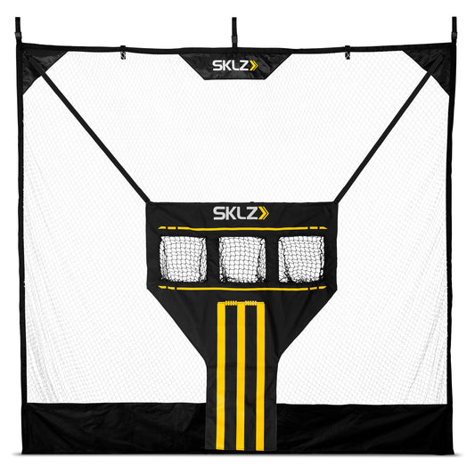 A portable soccer rebound net stands outdoors for practice or training sessions.