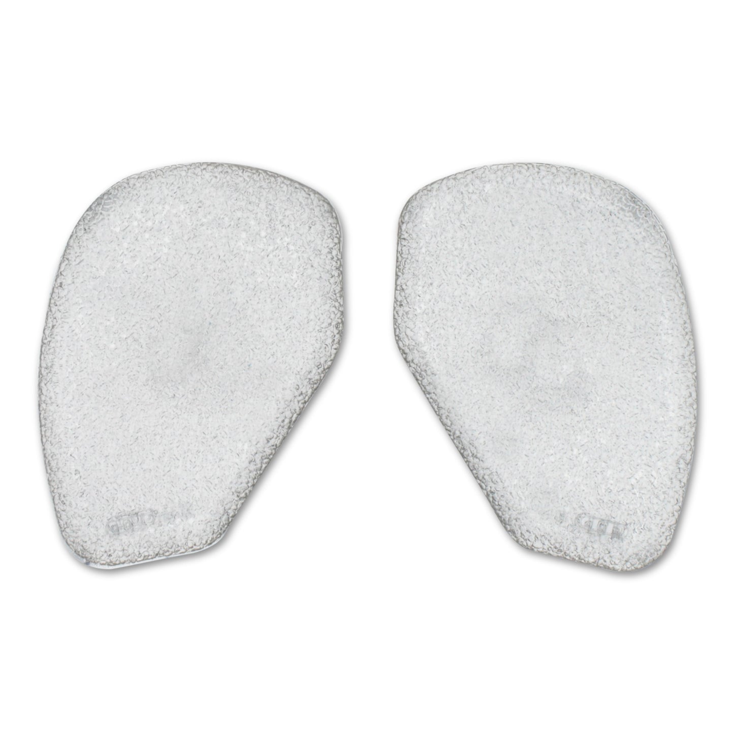 Two white foam pads used for skincare or facial cleansing in a white environment.