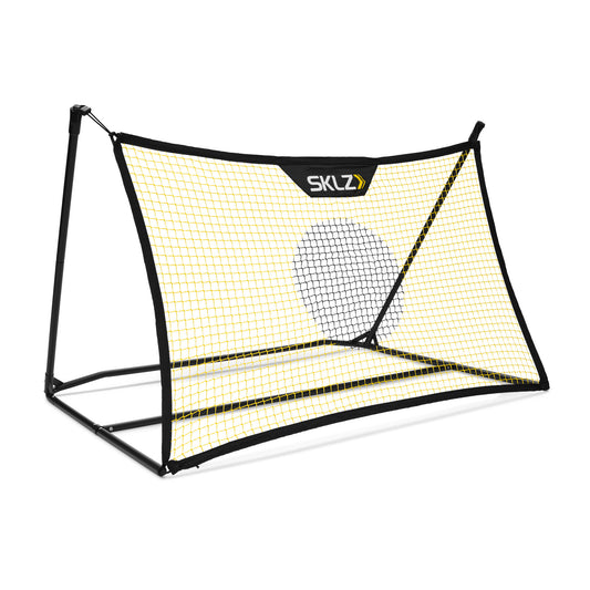 The hockey target strikes a ball into a net on a plain background