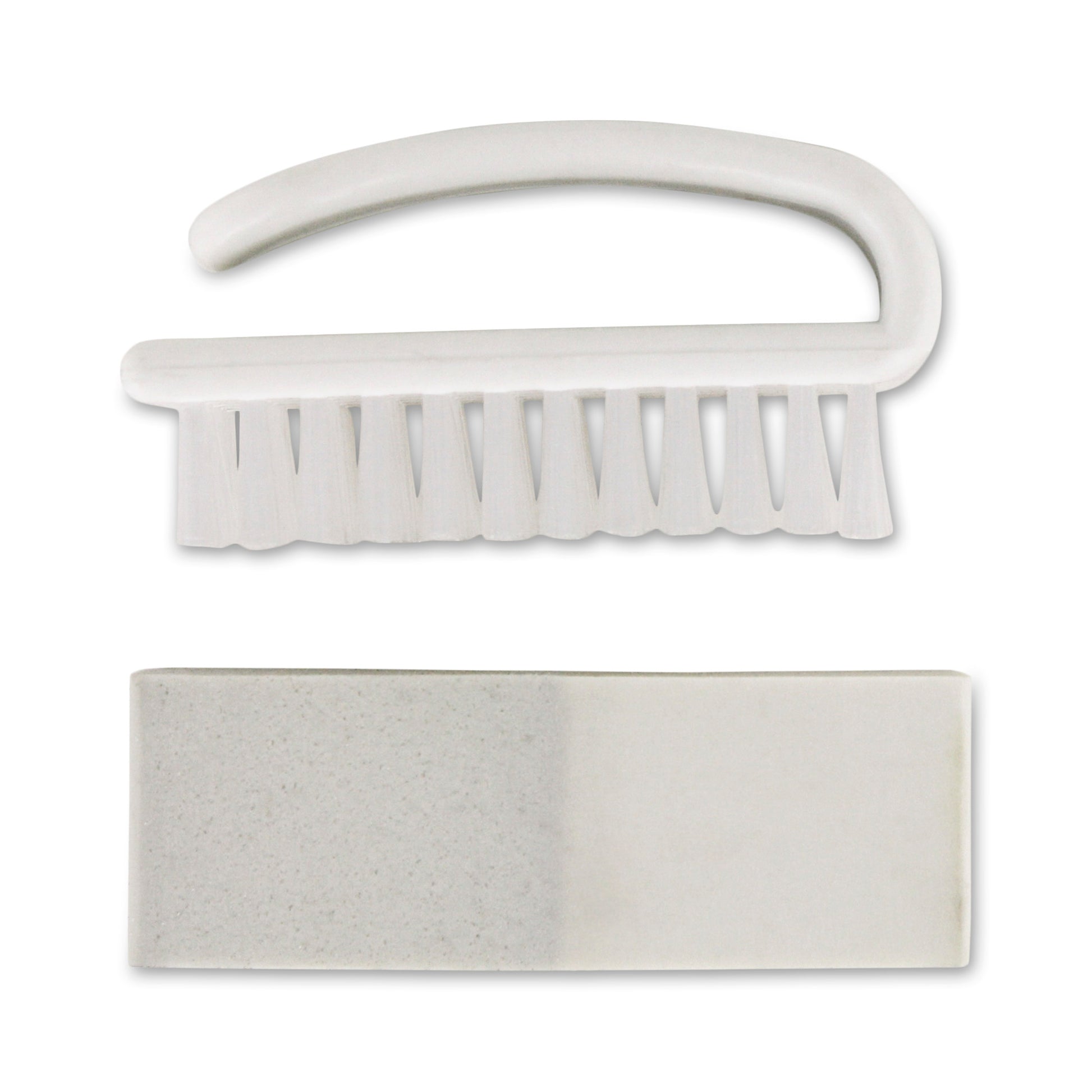 A white nail brush and soap bar are placed on a plain background.