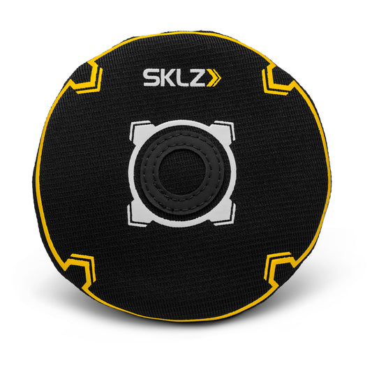 The object is a black and yellow BMX helmet insert with the text SKLZ on a plain white background.