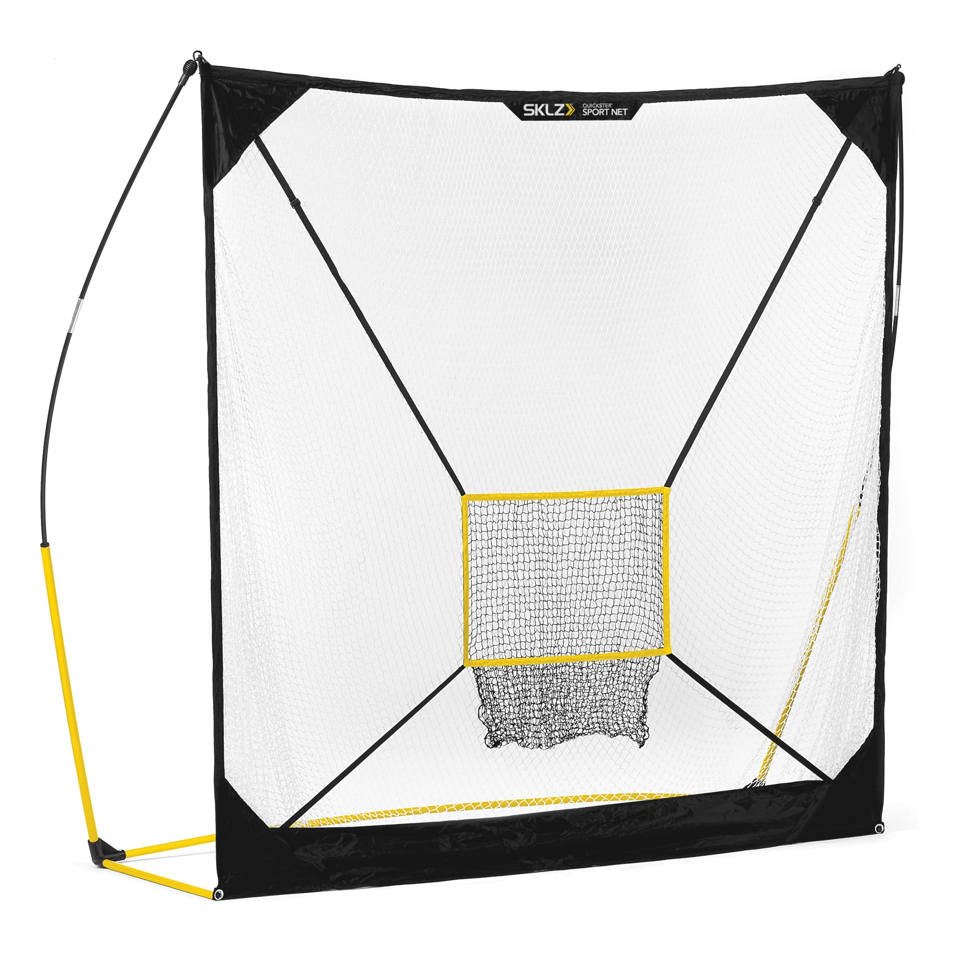 A portable golf hitting net is set up outdoors for practicing shots