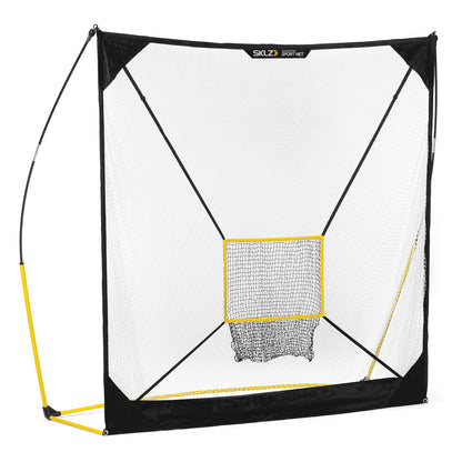 A portable golf hitting net is set up outdoors for practicing shots