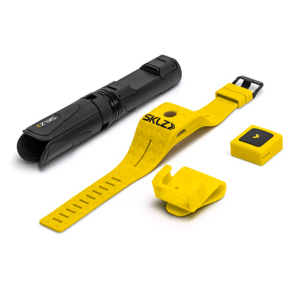 A rescue tool kit with a flashlight, yellow strap, and accessories in a rescue environment