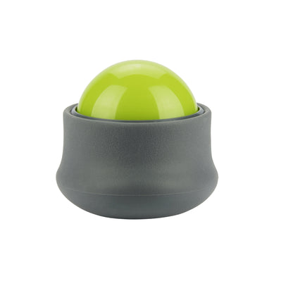 A lime green massage ball rests in a gray holder on a white background