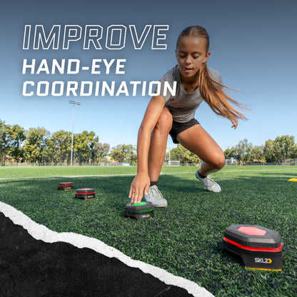 Girl practices footwork with speed training gadgets on a sports field to improve coordination