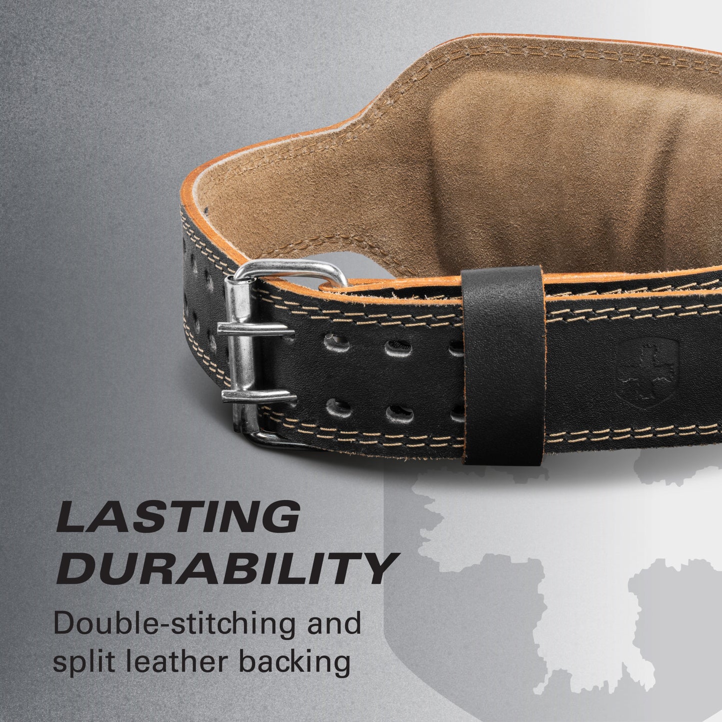 Leather belt with double-stitching and metal buckle on a gray background.