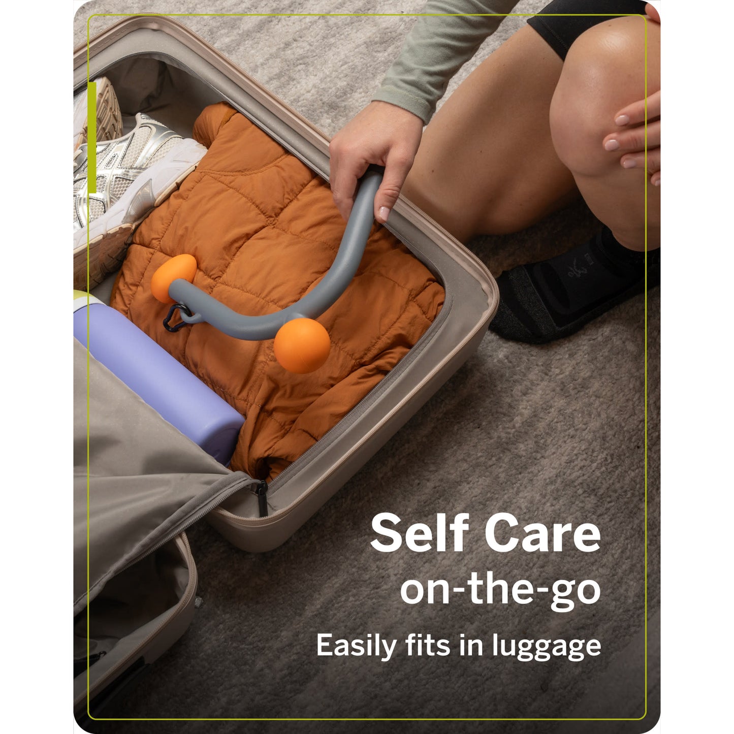 A person packs a travel stroller into luggage for easy mobility.